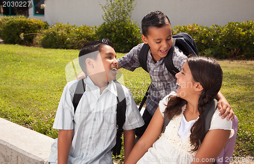 Image of Cute Brothers and Sister Talking, Ready for School