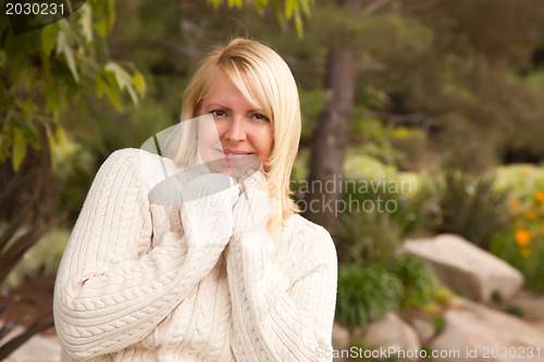 Image of Attractive Blonde Caucasian Woman in the Park