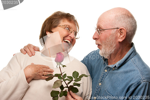 Image of Happy Senior Husband Giving Red Rose to Wife