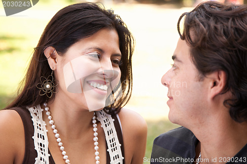 Image of Happy Attractive Hispanic Couple At The Park