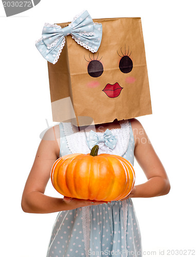 Image of Girl Wearing a Blue Dress and Happy Bag Face