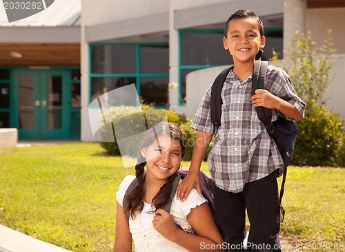 Image of Cute Hispanic Brother and Sister Ready for School