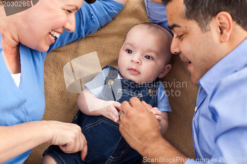 Image of Mixed Race Family Playing on the Blanket