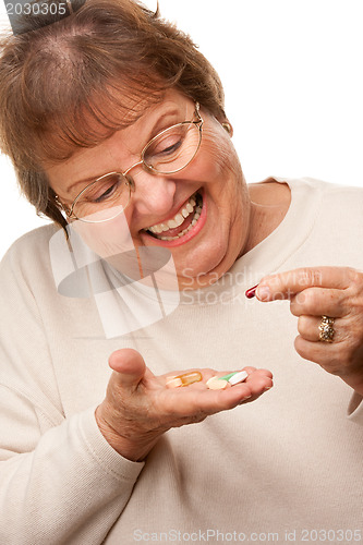 Image of Attractive Senior Woman and Medication Pills
