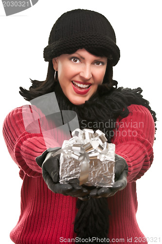 Image of Pretty Young Woman Offering Holiday Gift