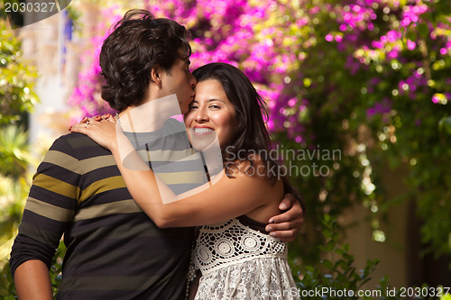 Image of Happy Attractive Hispanic Couple At The Park