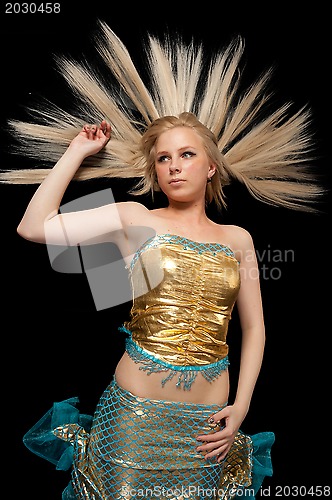 Image of Attractive girl in mermaid costume