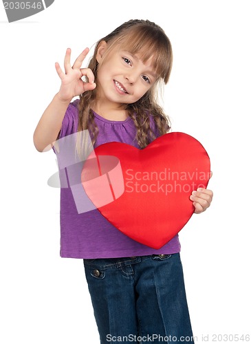 Image of Little girl with red heart
