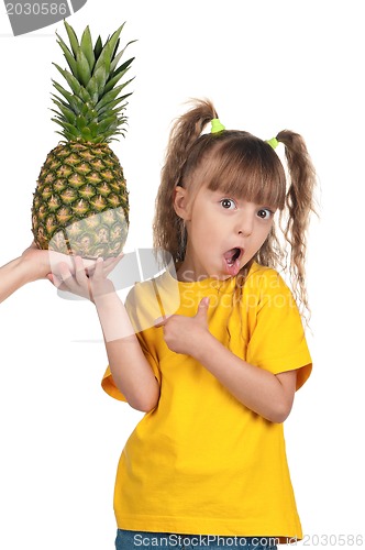 Image of Little girl with pineapple