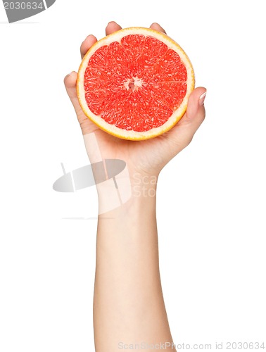 Image of Hand with grapefruit