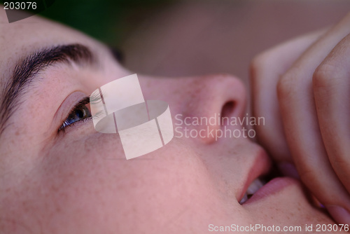 Image of finger at mouth