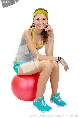 Image of Sports girl in shorts and a t-shirt.