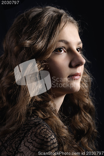 Image of Girl with long curly hair.
