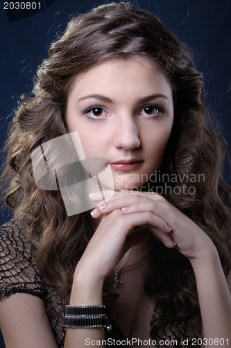 Image of Girl with long curly hair.