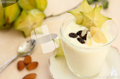 Image of Yogurt with almond and starfruit