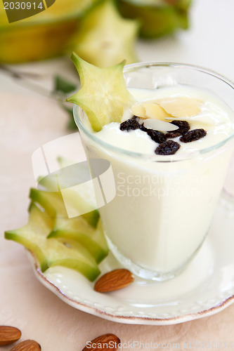 Image of Yogurt with almond and starfruit