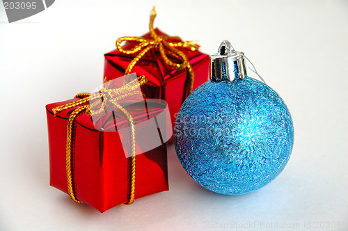 Image of Christmas gift boxes and bulb