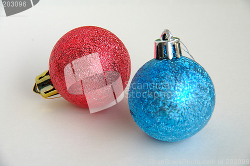 Image of Red and blue christmas bulbs