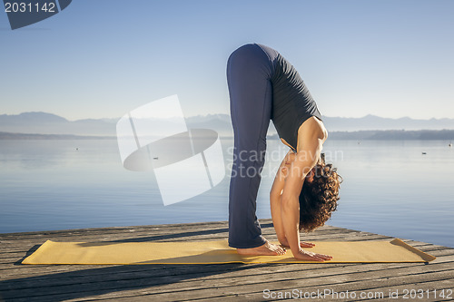 Image of yoga woman Uttanasana