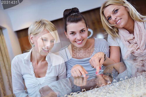 Image of girls shopping in jewelry store