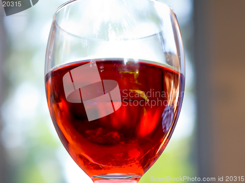 Image of Glass of red wine indoors