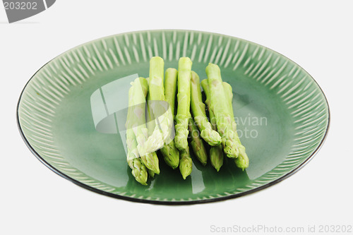 Image of Fresh asparagus shoots on a plate