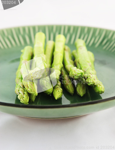 Image of Fresh asparagus shoots on a plate