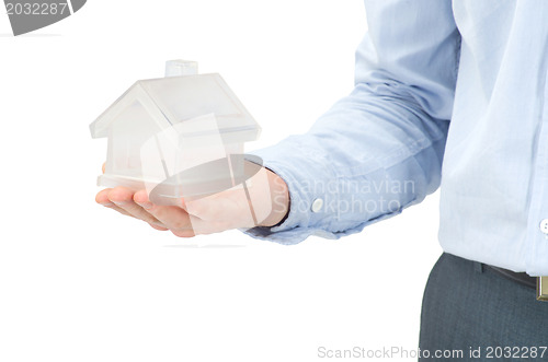 Image of home in hand