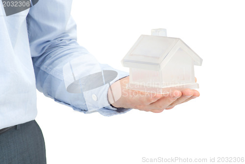 Image of home in hand