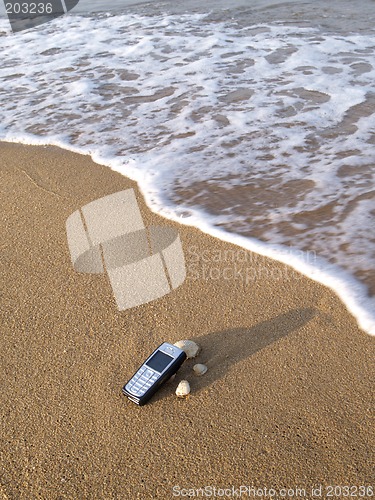 Image of Mobile phone and the sea