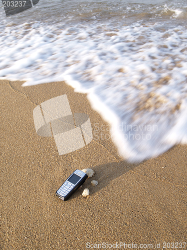 Image of Mobile phone and the sea