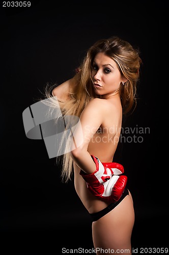Image of beautiful nude girl with boxing gloves