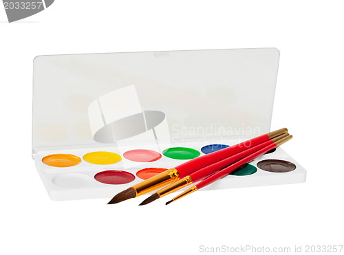 Image of Watercolor paints and brushes on white