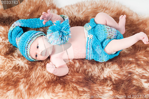 Image of Newborn baby in blue