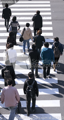 Image of Group of people crossing the street