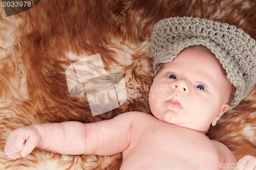 Image of Newborn baby in hat