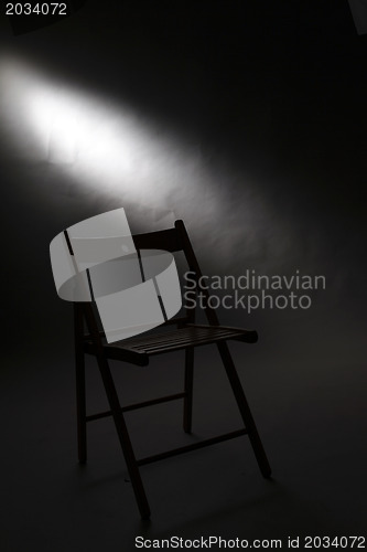 Image of A wood foldable chair