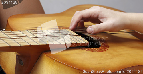 Image of Playing the guitar