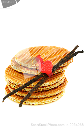 Image of Waffles with caramel cream, decorated with red heart.