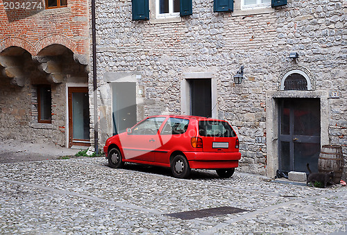 Image of Red Car in Old Town