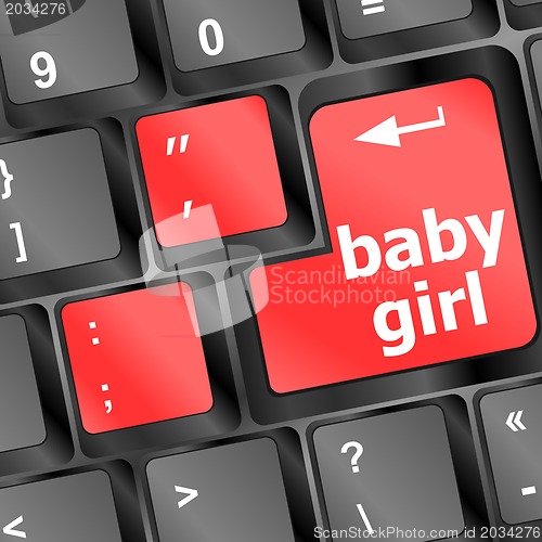 Image of Baby girl key on laptop keyboard