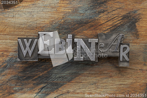 Image of webinar word in metal type
