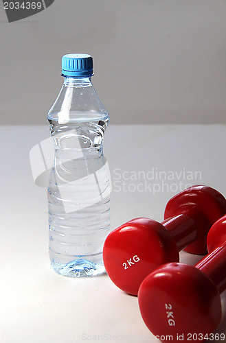 Image of Red dumbbells 