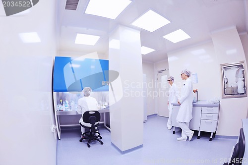 Image of scientists working at the laboratory