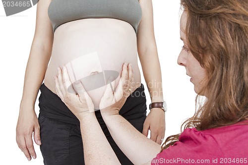 Image of midwife fingering at human belly