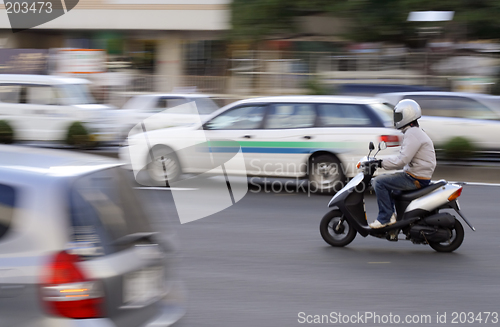 Image of Scooter in traffic