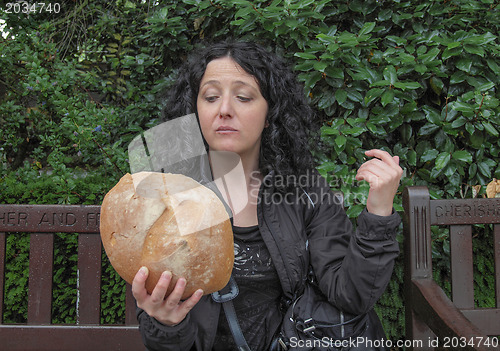 Image of Girl eating bread