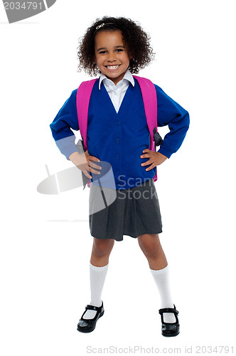 Image of Primary school girl posing confidently