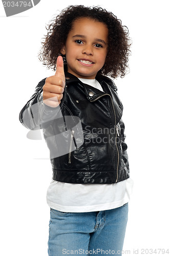 Image of Stylish child savoring sweet success