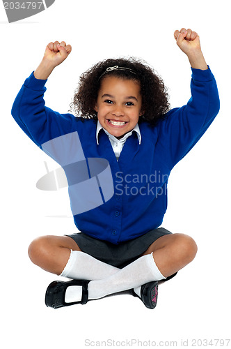 Image of Primary school girl grinding her teeth in excitement
